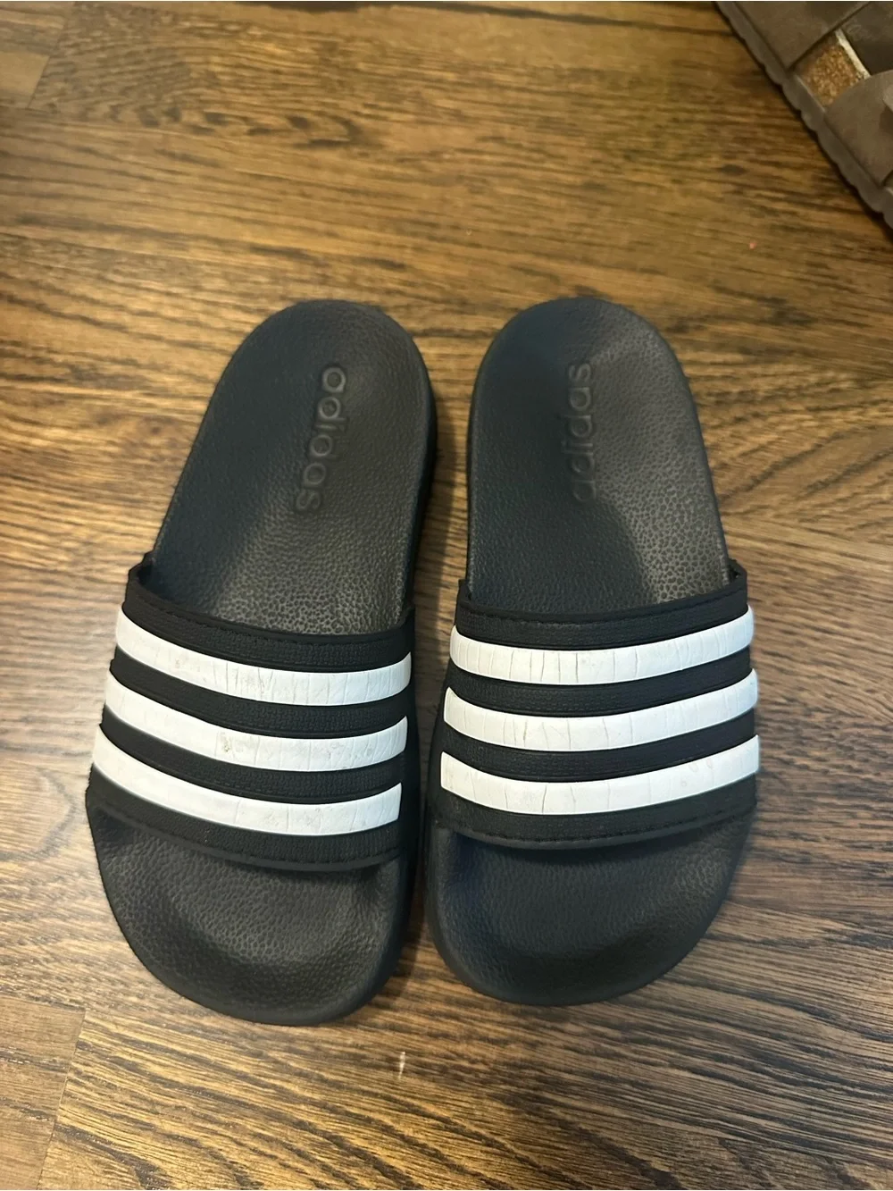 adidas Black Slides with White Three-Stripes